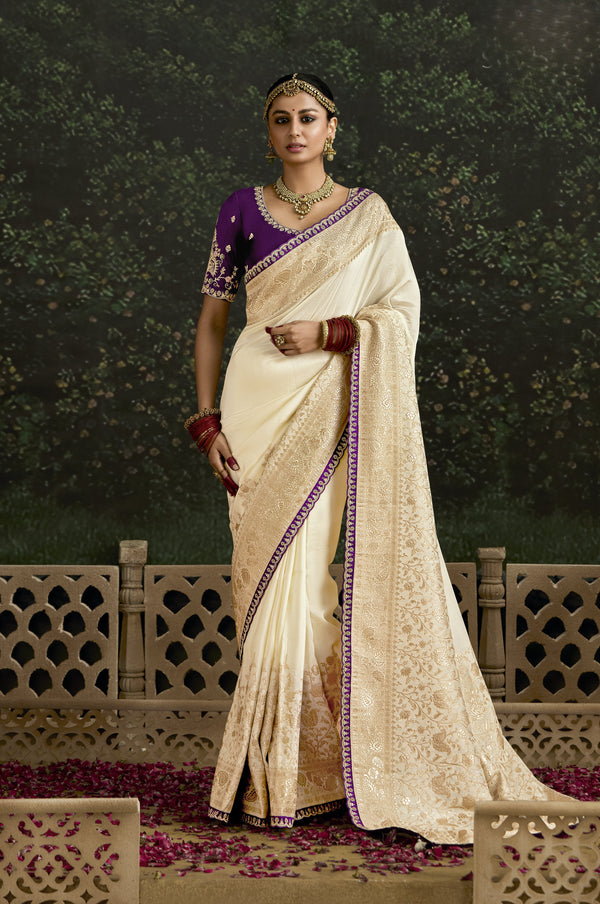 off white silk shaadi day wear sari with purple blouse