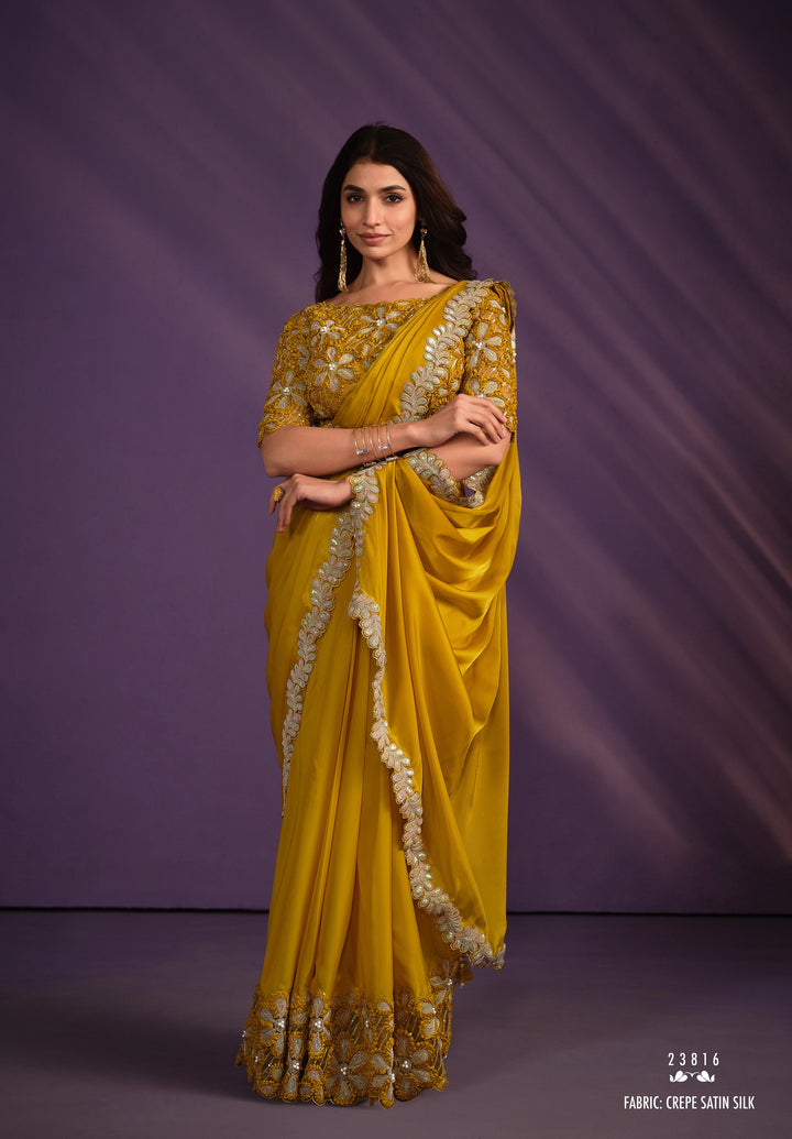 marriage function wear yellow saree with belt and sequins moti work blouse