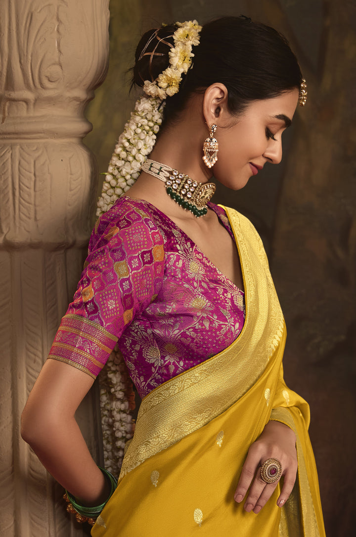 haldi wear saree in yellow with brocade blouse